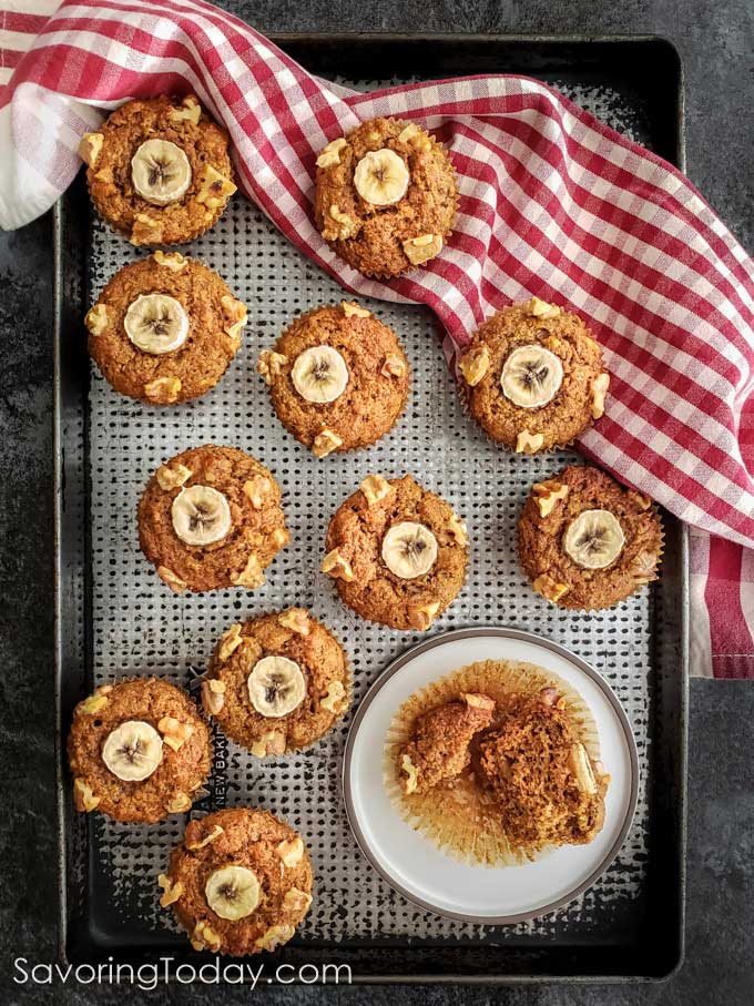 Healthy breakfast muffins made with 100% sprouted wheat, 6 bananas and walnuts for a tasty breakfast treat you can feel good about. Healthy breakfast muffins made with whole grain, crowned with banana and walnuts on top.